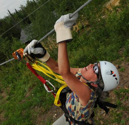 Ann rides the zipline by Chris Polydoroff